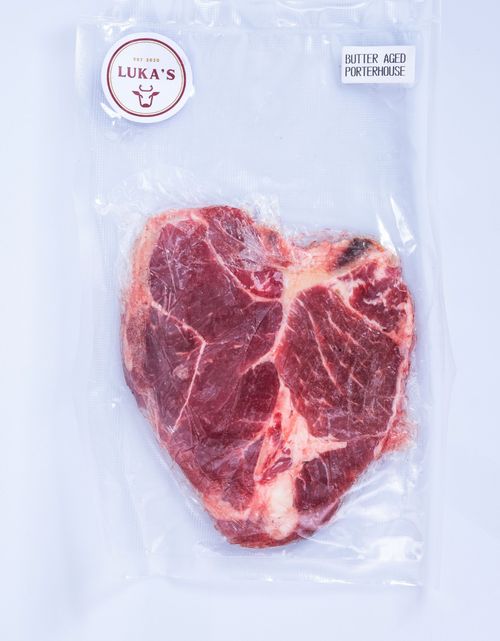 Load image into Gallery viewer, Australian Porterhouse Butter-Aged Steak 1kg (4 slices)
